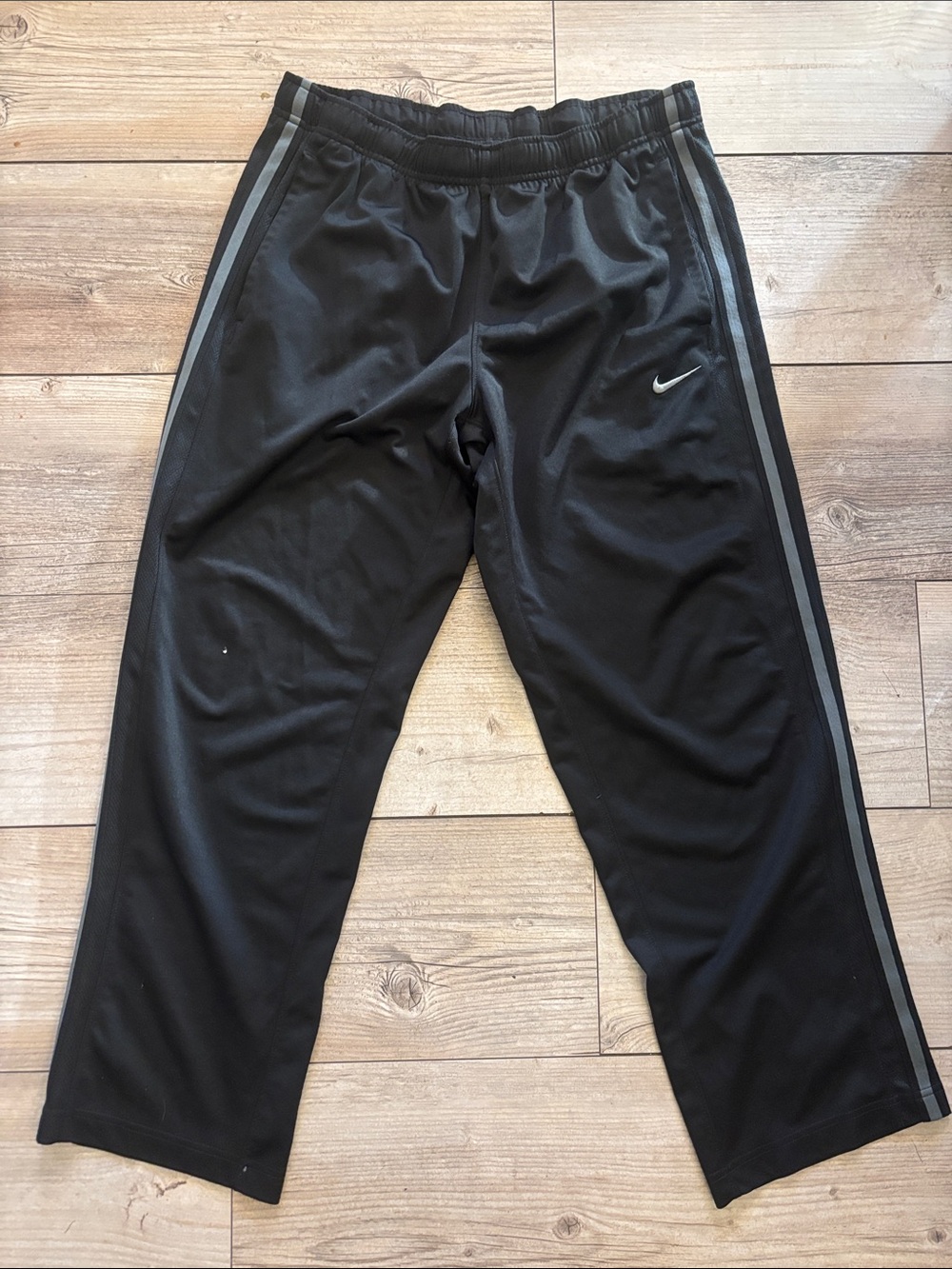Nike Black Jogger-Style Track Pants with Reflective Swoosh